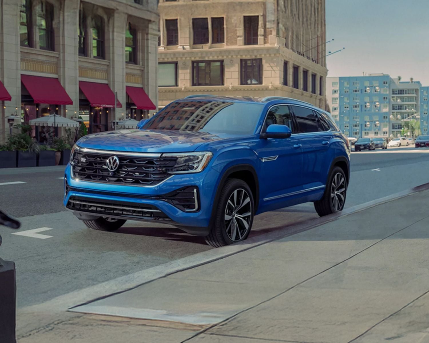 Blue 2026 Volkswagen SUV parked on a city street